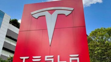 Today stock market, the Dow barely wins as inflation falls, and Tesla leads growth stocks higher.