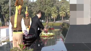 Interpol degation honours the National Police Memorial.