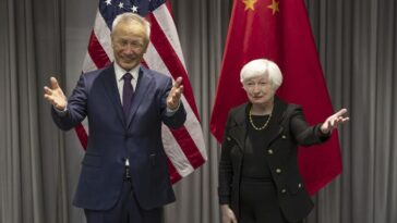 Officials from the US and China discuss the environment, the economy and bilateral ties