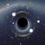 Astronomers discover a black hole 300 million light years distant that is bending a star into a doughnut shape.