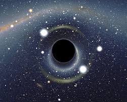 Astronomers discover a black hole 300 million light years distant that is bending a star into a doughnut shape.