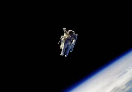 Crew Members Work on Spacewalk Preparations and Scientific Equipment