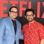 Aamir Khan shakes hands with paparazzo, poses for pics with Karan Johar at Netflix event. See pics