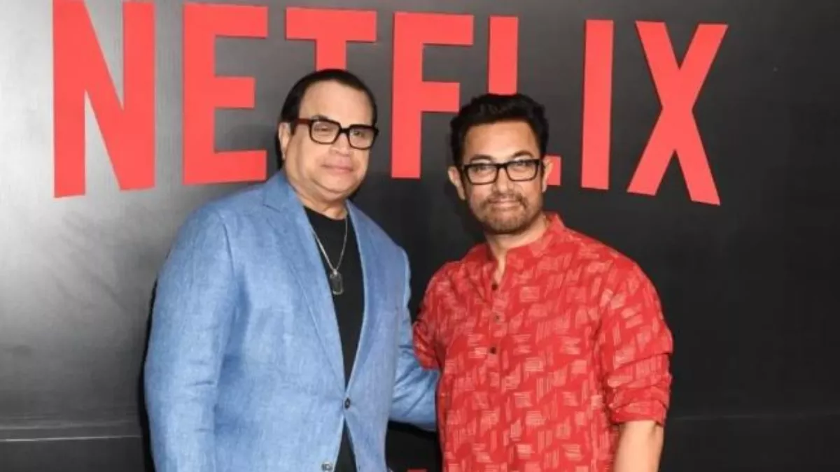 Aamir Khan shakes hands with paparazzo, poses for pics with Karan Johar at Netflix event. See pics