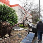 In the U.S. state of California, a tornado rips off roofs and throws cars around