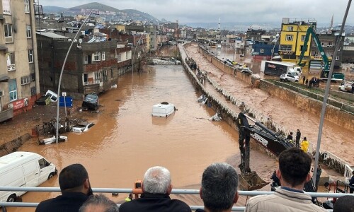 At least 14 people are killed by flash floods in the Turkish earthquake zone