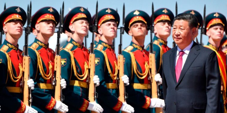 The Chinese leader Xi Jinping arrives in Moscow for a summit with Vladimir Putin