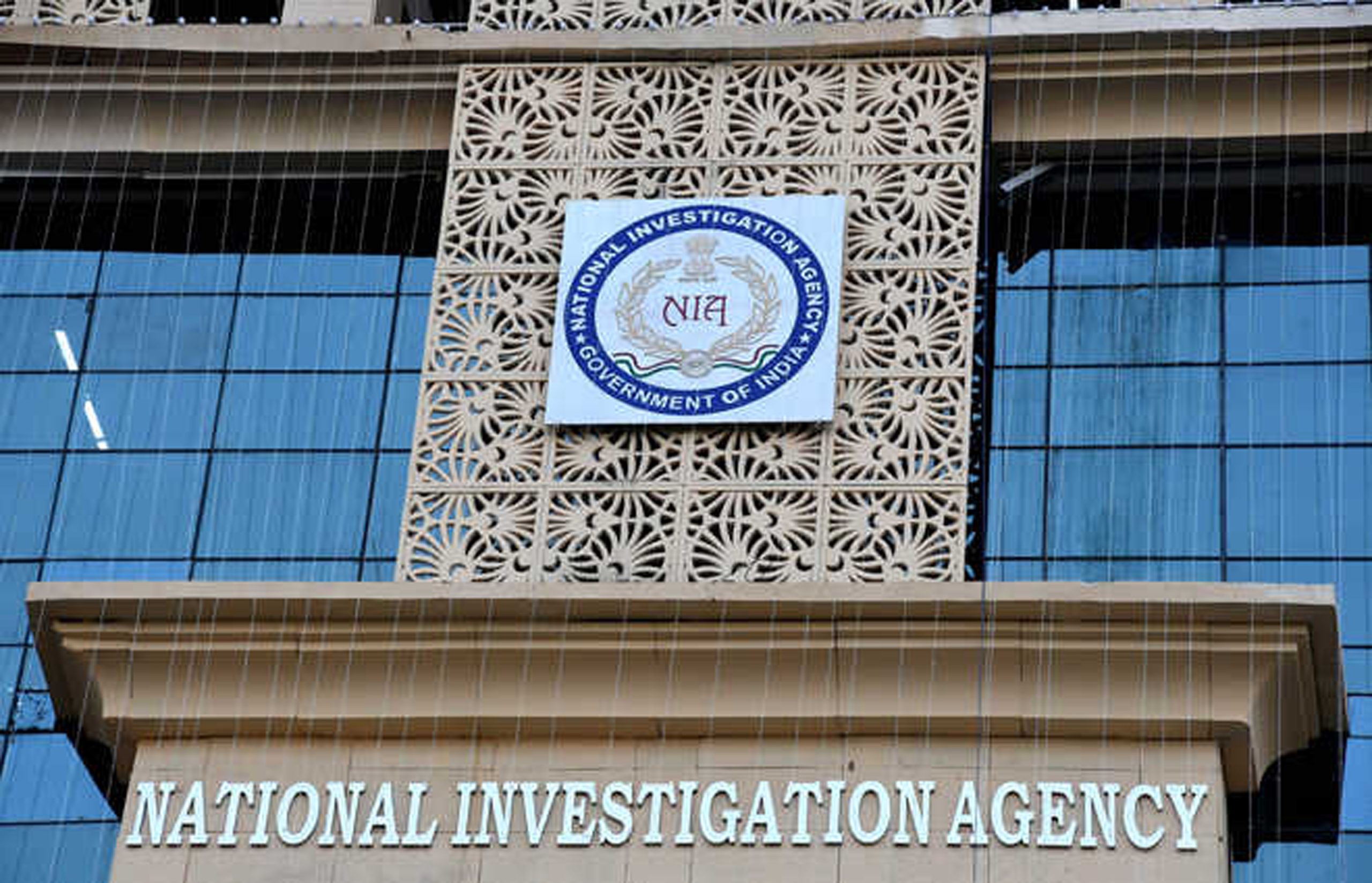 NIA officer suspended on corruption charges