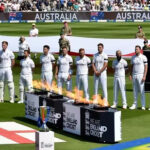 Players, officials wear black armbands