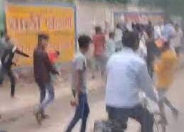 Nangloi Muharram procession clashes, injuring police and vandalising vehicles.