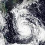 Typhoon Khanun, described as "very strong" by the Japanese weather agency, brought maximum sustained wind speeds of 180 kilometres (112 miles) an hour. One person was reportedly killed and hundreds of thousands were without electricity in southern Japan on Wednesday as a typhoon approached packing powerful winds and lashing rain. This satellite image shows Typhoon Khanun moving north towards Okinawa, southwestern Japan.(AP) This satellite image shows Typhoon Khanun moving north towards Okinawa, southwestern Japan.(AP) Hundreds of flights to Okinawa and other islands in the area were cancelled, stranding thousands of tourists holidaying in the region's tropical beach resorts. Typhoon Khanun, described as "very strong" by the Japanese weather agency, brought maximum sustained wind speeds of 180 kilometres (112 miles) an hour. Okinawa's power company said 220,580 households -- nearly 35 percent of the total in the region -- had no electricity early on Wednesday. An evacuation warning issued across Okinawa and the southern part of Kagoshima region was in place, urging more than 690,000 residents to move to safety, according to the Fire and Disaster Management Agency. The agency said a total of 11 people in Okinawa were mildly injured. A 90-year-old man died after being trapped under a collapsed garage on Tuesday evening, public broadcaster NHK reported, adding that strong winds were probably the cause. PROMOTED Hearing Aids that can help You Hearing Aid | Search Ads | Sponsored 3 & 4 Bed Homes Starting at ₹ 2.99 Cr in Noida Godrej Tropical | Sponsored Nuh to Gurugram: The spread of violence Hindustan Times Born between 1970 - 1990? Check eligibility for ₹1 Cr term plan** Free Term Insurance Calculator | Sponsored ‘Don't want luxury': Hardik Pandya slams West Indies cricket board for not making ‘basic arrangements’ for Team India Hindustan Times Delhi: Click Here To See The Price Of Solar Panels Solar Panels | Search Ads | Sponsored As A Single Mother, I Am Unable To Save My Daughter Alone! Ketto | Sponsored Belly Fat Removal Without Surgery In Delhi: The Price Might Surprise You Affordable Liposuction | Sponsored The Japan Meteorological Agency warned of flooding and landslides in some parts of the main island of Okinawa. The typhoon was about 70 kilometres south of Okinawa's remote Kumejima island at 2300 GMT and was moving west-northwest, according to the JMA. It was expected to cross to eastern China later in the week. More than 400 flights were cancelled on Wednesday, according to NHK, affecting more than 65,000 passengers. On Tuesday, tourists made long queues at the main Naha airport, hoping to get back home. "We haven't been able to secure a hotel and we don't know when the return flight can be booked," Minako Kawakami told local daily Okinawa Times.