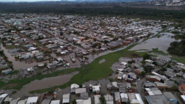 At least 27 dead, 1,600 homeless in Brazil storm as family seek aid.