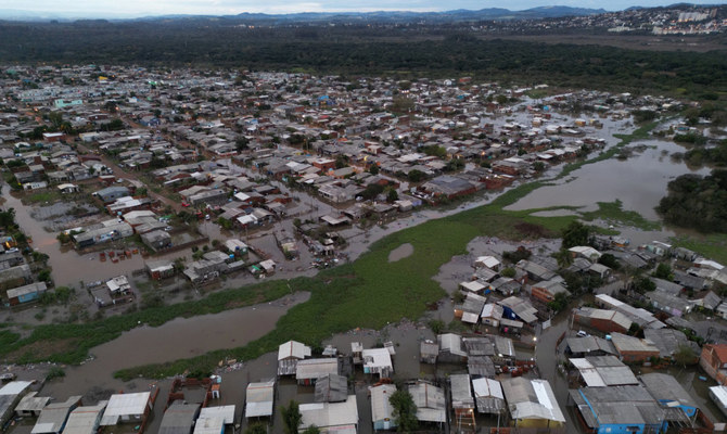 At least 27 dead, 1,600 homeless in Brazil storm as family seek aid.